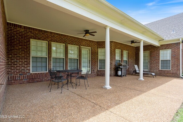 7247 Eastern Rd, Olive Branch, MS 38654 - view of patio with a ceiling fan, area for grilling, and outdoor dining area