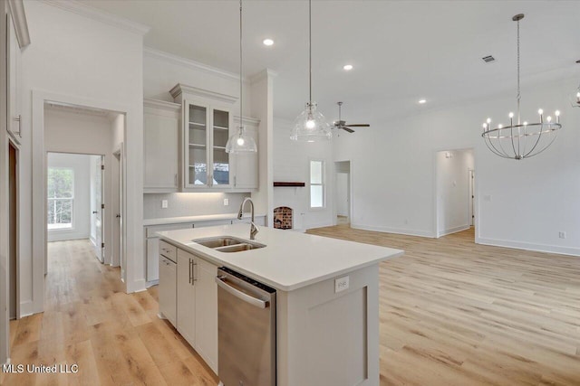 961 Mullican Rd, Florence, MS 39073 - kitchen with dishwasher, a sink, an island with sink, light wood finished floors, and a ceiling fan