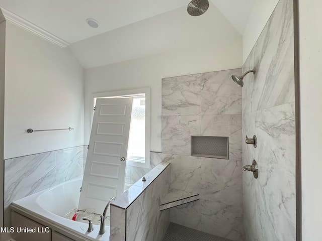 full bathroom featuring lofted ceiling, a garden tub, and a marble finish shower