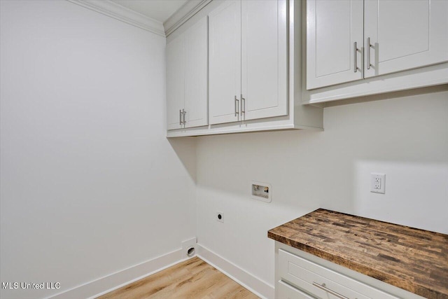 961 Mullican Rd, Florence, MS 39073 - washroom featuring washer hookup, light wood-style flooring, baseboards, hookup for an electric dryer, and crown molding