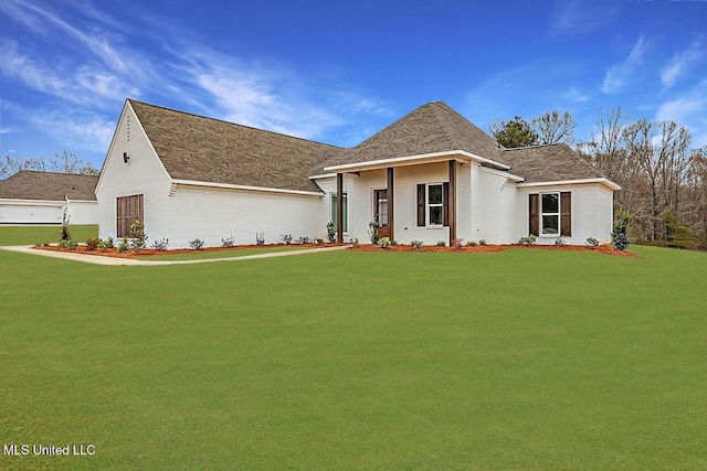 961 Mullican Rd, Florence, MS 39073 - view of front of house with a front yard and a shingled roof