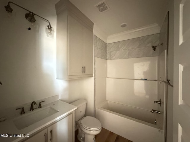 bathroom featuring crown molding, visible vents, toilet, tub / shower combination, and vanity