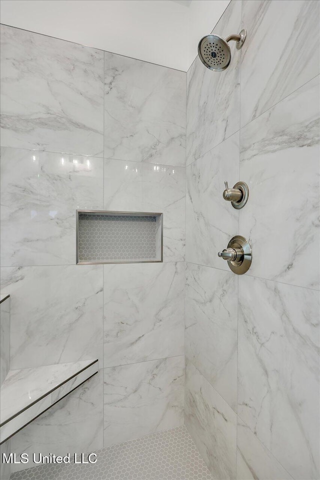 961 Mullican Rd, Florence, MS 39073 - bathroom featuring tiled shower