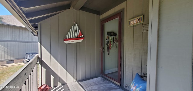 doorway to property featuring a balcony