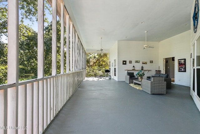 view of patio with ceiling fan and an outdoor hangout area