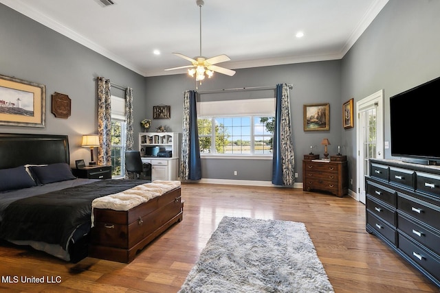 bedroom featuring light hardwood / wood-style floors, ceiling fan, and ornamental molding