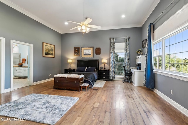 bedroom with ensuite bath, ceiling fan, ornamental molding, and hardwood / wood-style flooring