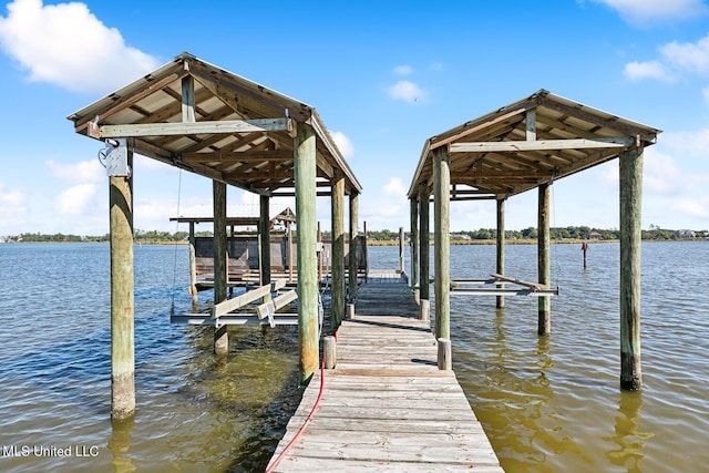 view of dock featuring a water view