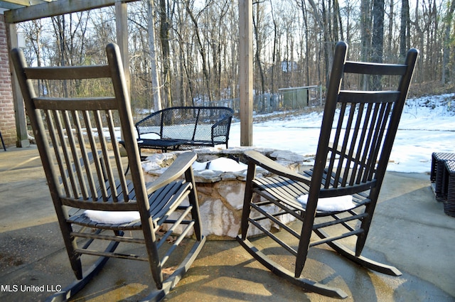 view of snow covered patio