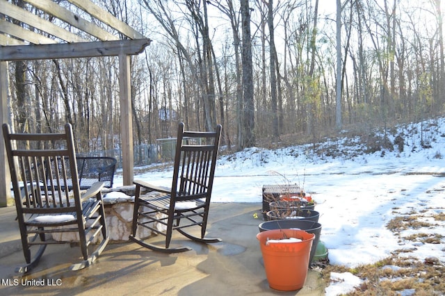 view of snow covered patio