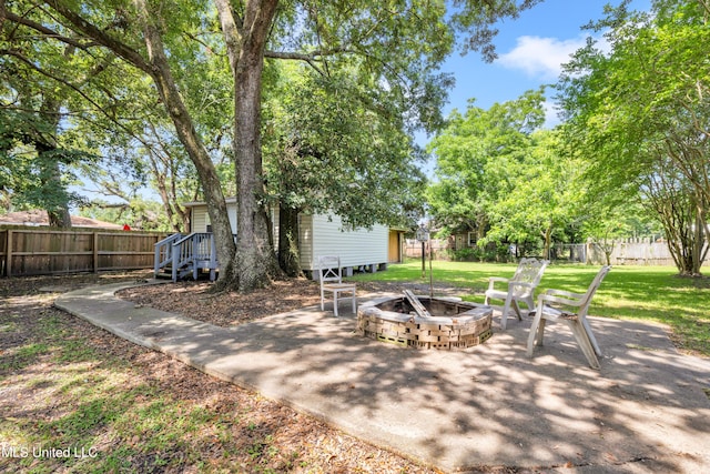 310 John Ave, Pascagoula, MS 39567 - view of patio with a fire pit