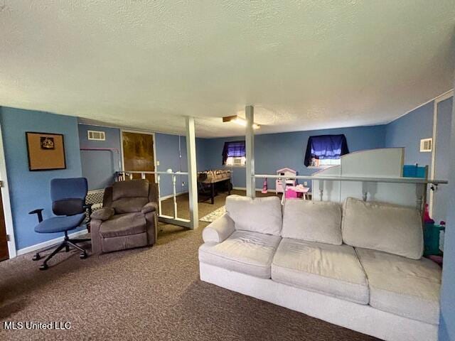 149 Martin Cir, Mendenhall, MS 39114 - living room with a textured ceiling, carpet, and baseboards
