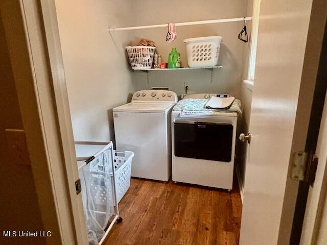 149 Martin Cir, Mendenhall, MS 39114 - washroom with washing machine and dryer and wood finished floors