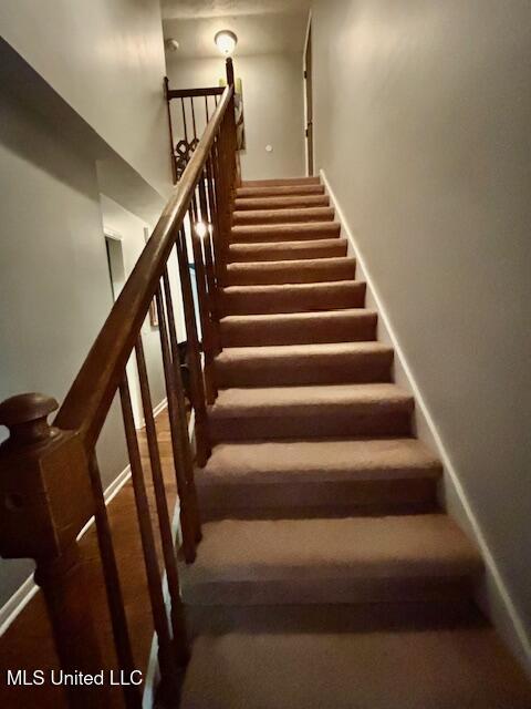 149 Martin Cir, Mendenhall, MS 39114 - stairway featuring carpet flooring