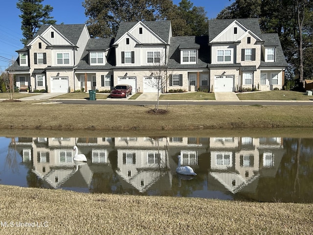 1049 Lexington Lp, Southaven, MS 38671 - exterior space with a water view and a lawn