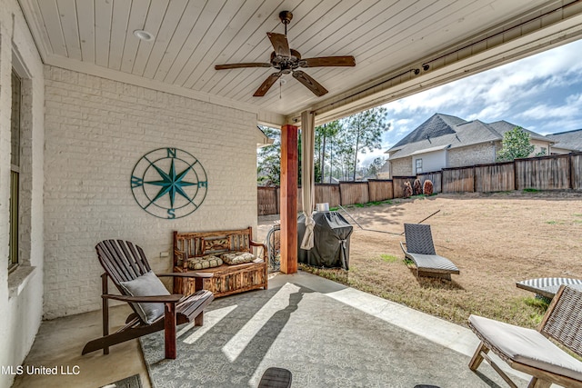 view of patio / terrace with ceiling fan and a fenced backyard