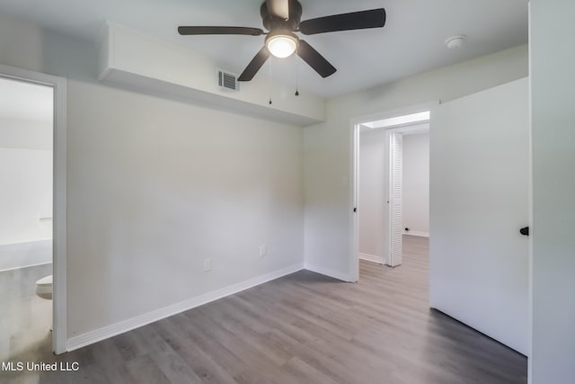 2550 Davidson Rd, Ocean Springs, MS 39564 - spare room with a ceiling fan, wood finished floors, baseboards, and a smoke detector