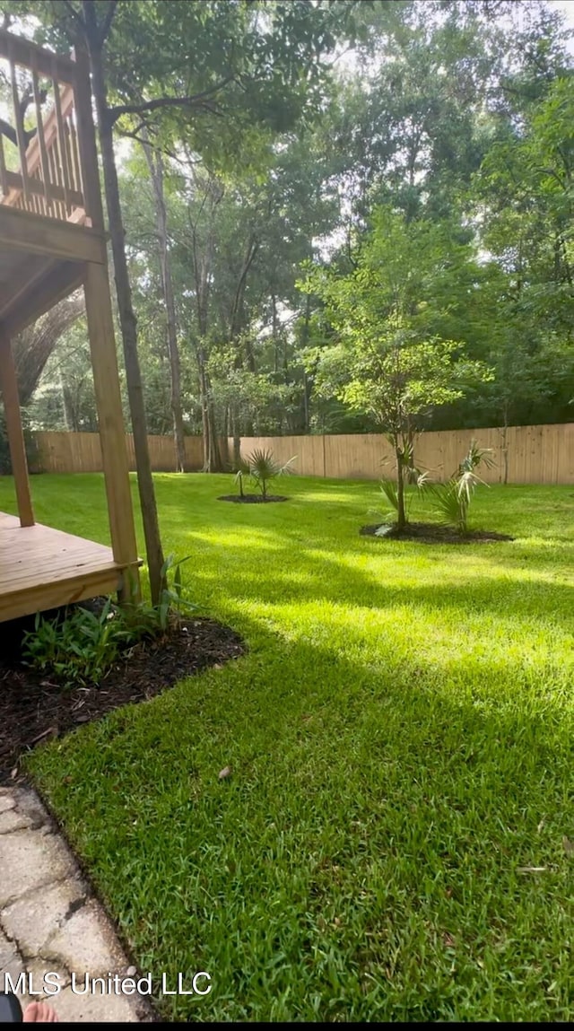 2550 Davidson Rd, Ocean Springs, MS 39564 - view of yard featuring a wooden deck