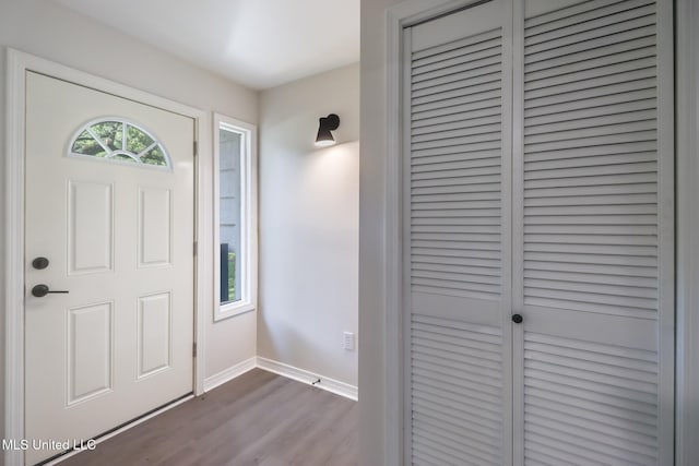 2550 Davidson Rd, Ocean Springs, MS 39564 - foyer entrance with dark wood-style floors and baseboards
