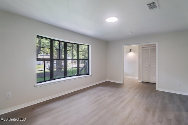 2550 Davidson Rd, Ocean Springs, MS 39564 - unfurnished room featuring wood finished floors and baseboards