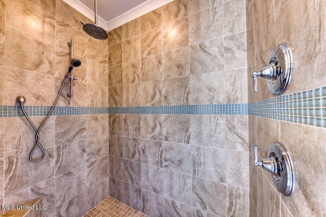 bathroom featuring a tile shower