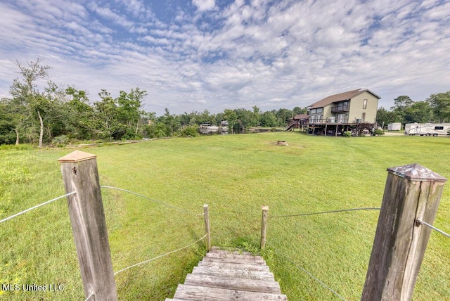 view of yard featuring a wooden deck