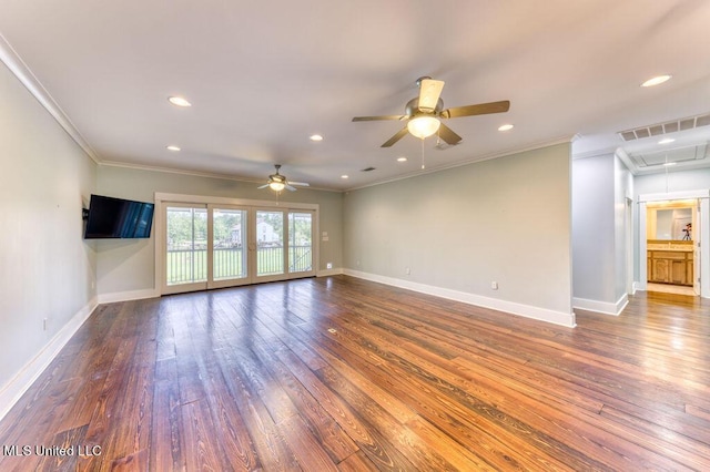 empty room featuring ceiling fan, dark hardwood / wood-style flooring, and ornamental molding