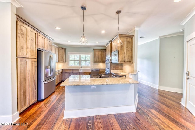 kitchen with light stone countertops, stainless steel appliances, kitchen peninsula, crown molding, and decorative light fixtures