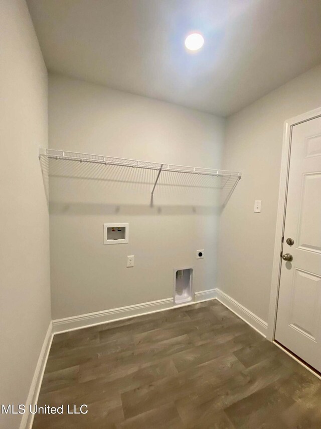 laundry area featuring washer hookup, electric dryer hookup, and dark wood-type flooring