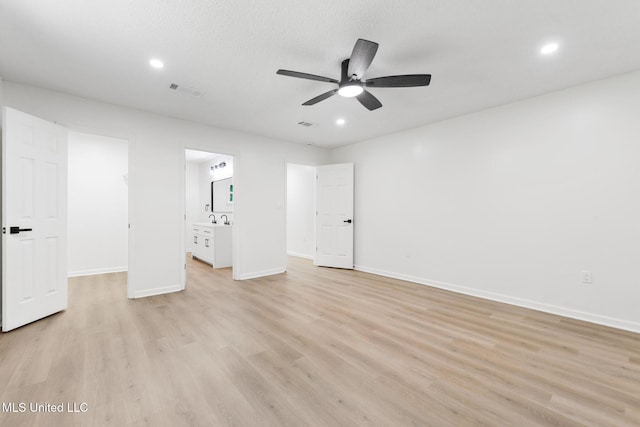 3917 Wildwood Rd, Moss Point, MS 39562 - unfurnished bedroom featuring recessed lighting, light wood finished floors, ensuite bath, and ceiling fan