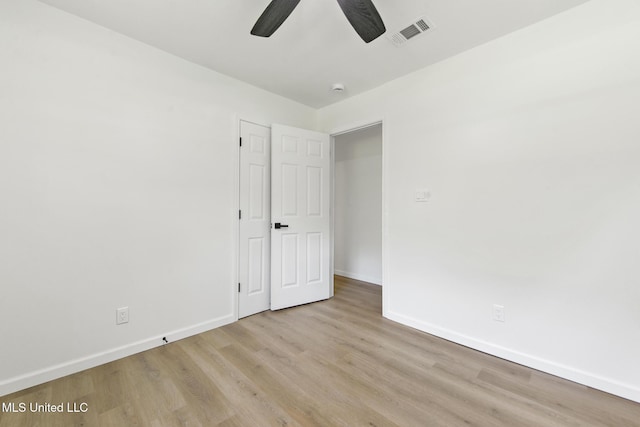 3917 Wildwood Rd, Moss Point, MS 39562 - unfurnished bedroom featuring wood finished floors and ceiling fan