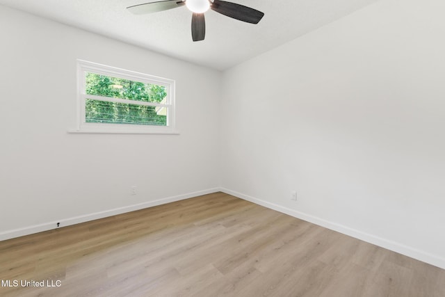 3917 Wildwood Rd, Moss Point, MS 39562 - unfurnished room with light wood-style floors and ceiling fan