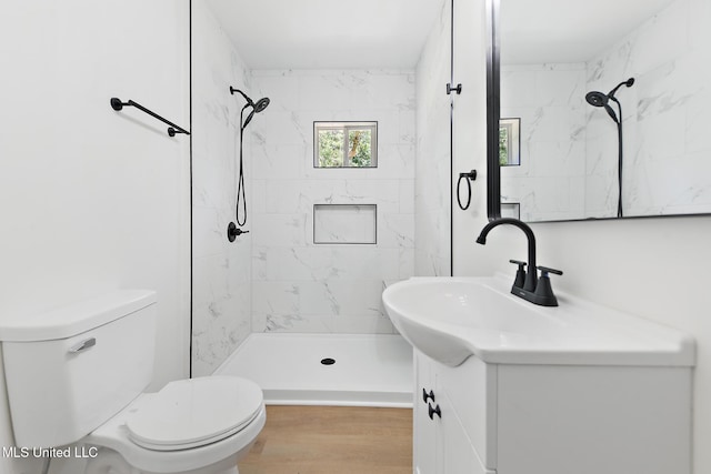 3917 Wildwood Rd, Moss Point, MS 39562 - bathroom featuring vanity, a shower stall, and wood finished floors