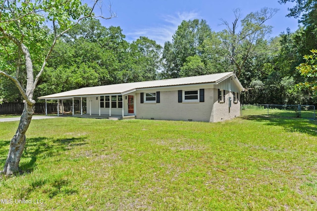 3917 Wildwood Rd, Moss Point, MS 39562 - single story home featuring crawl space, a metal roof, a carport, and brick siding