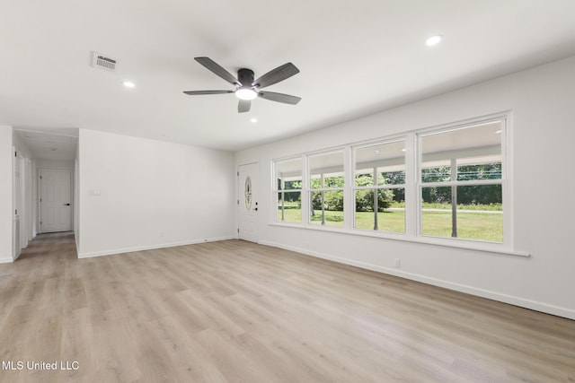 3917 Wildwood Rd, Moss Point, MS 39562 - unfurnished living room featuring ceiling fan, light wood-type flooring, and recessed lighting