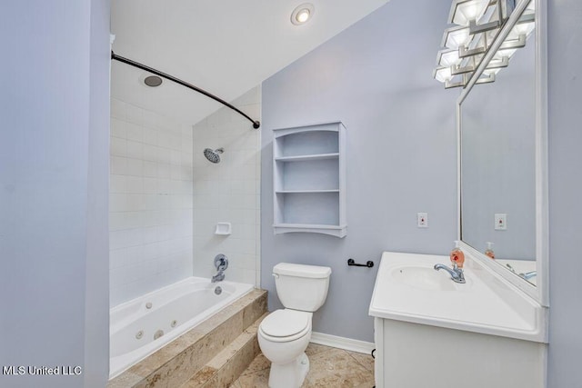 full bathroom with vanity, tile patterned floors, toilet, and tiled shower / bath