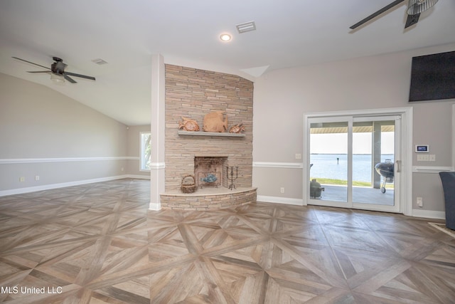 unfurnished living room featuring visible vents, a ceiling fan, and baseboards