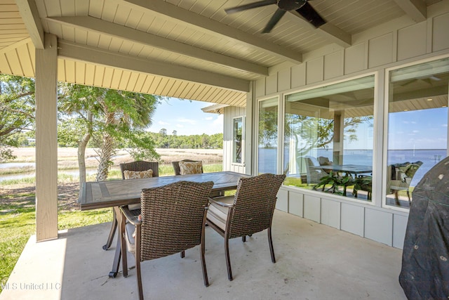 view of patio featuring a ceiling fan and outdoor dining space