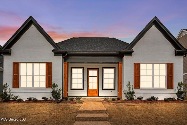 view of front of house with a lawn