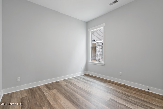 empty room featuring light hardwood / wood-style floors