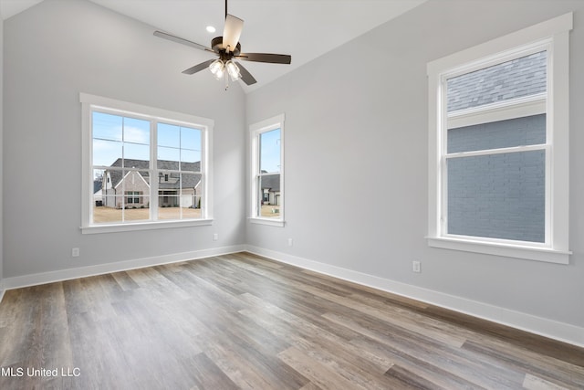 unfurnished room featuring wood-type flooring and ceiling fan