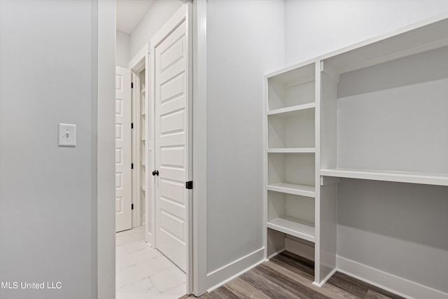 interior space with hardwood / wood-style flooring