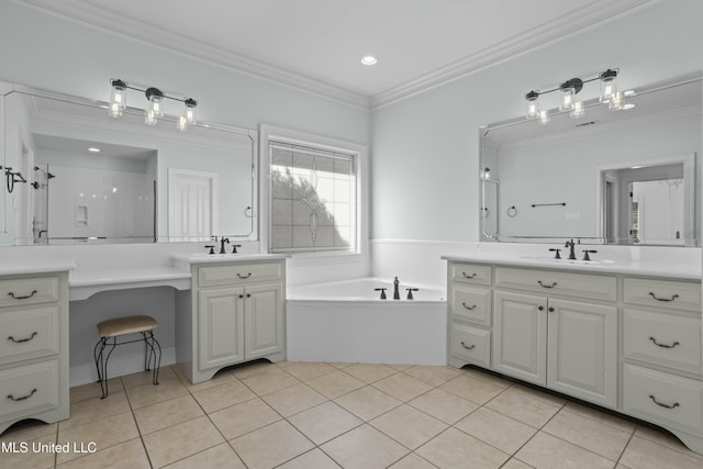 bathroom featuring a bathtub, tile patterned floors, vanity, and crown molding