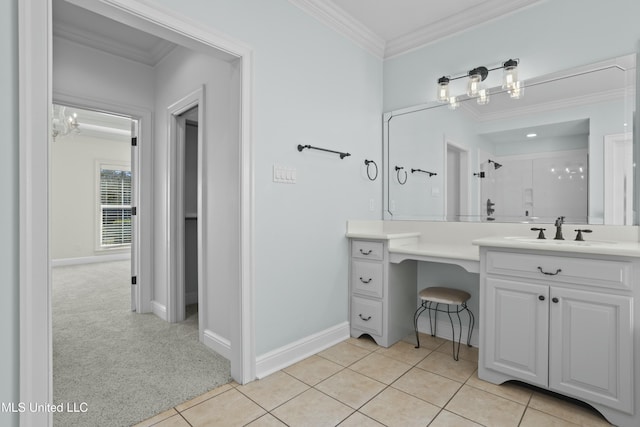 bathroom with tile patterned flooring, vanity, walk in shower, a chandelier, and crown molding