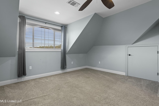 bonus room featuring ceiling fan, lofted ceiling, and carpet flooring