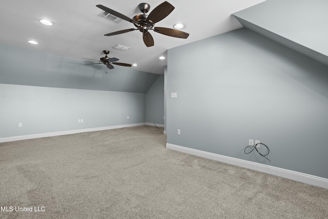 bonus room with ceiling fan, carpet floors, and lofted ceiling