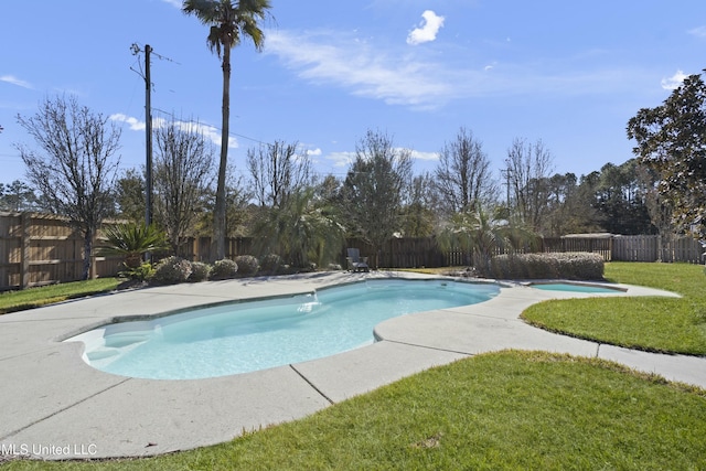 view of pool with a lawn