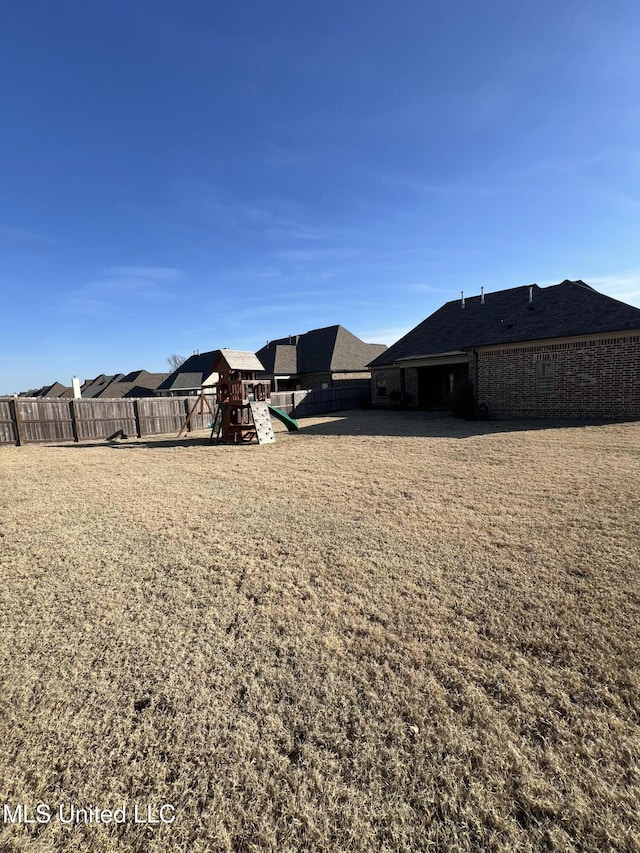 view of yard with a playground