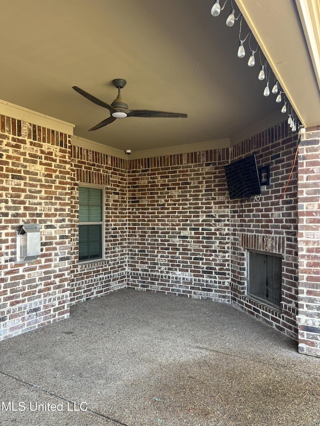 view of patio / terrace featuring ceiling fan