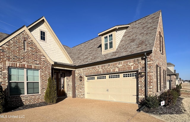 view of front of home with a garage